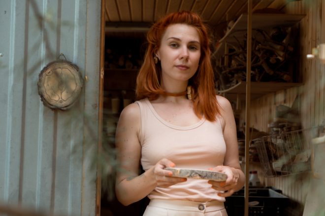 Business woman in woodworking workshop