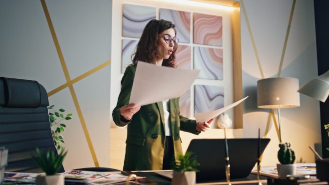 Businesswoman discussing project online at office videoconference. Woman webinar