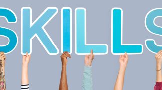 Hands holding the word skills