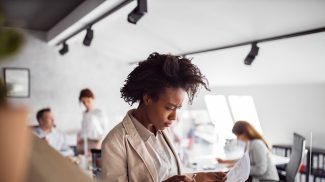 Holding one document with new ideas.