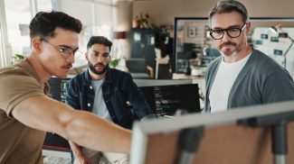 Programmer, planning and presentation with business people in office for website developer, coding