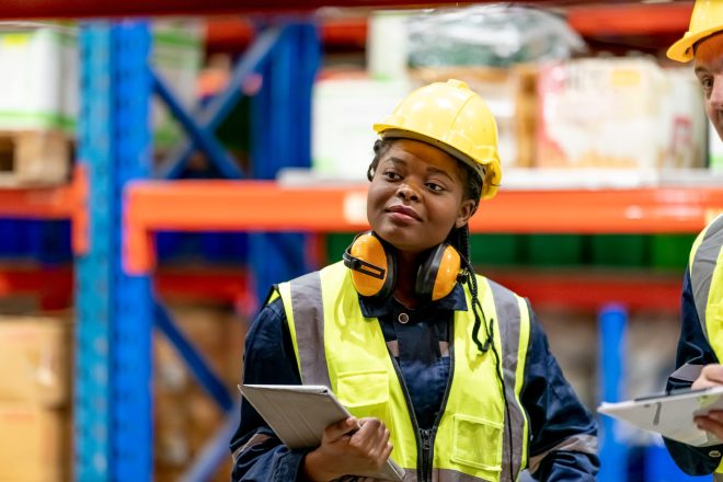 Warehouse workers checking the inventory.