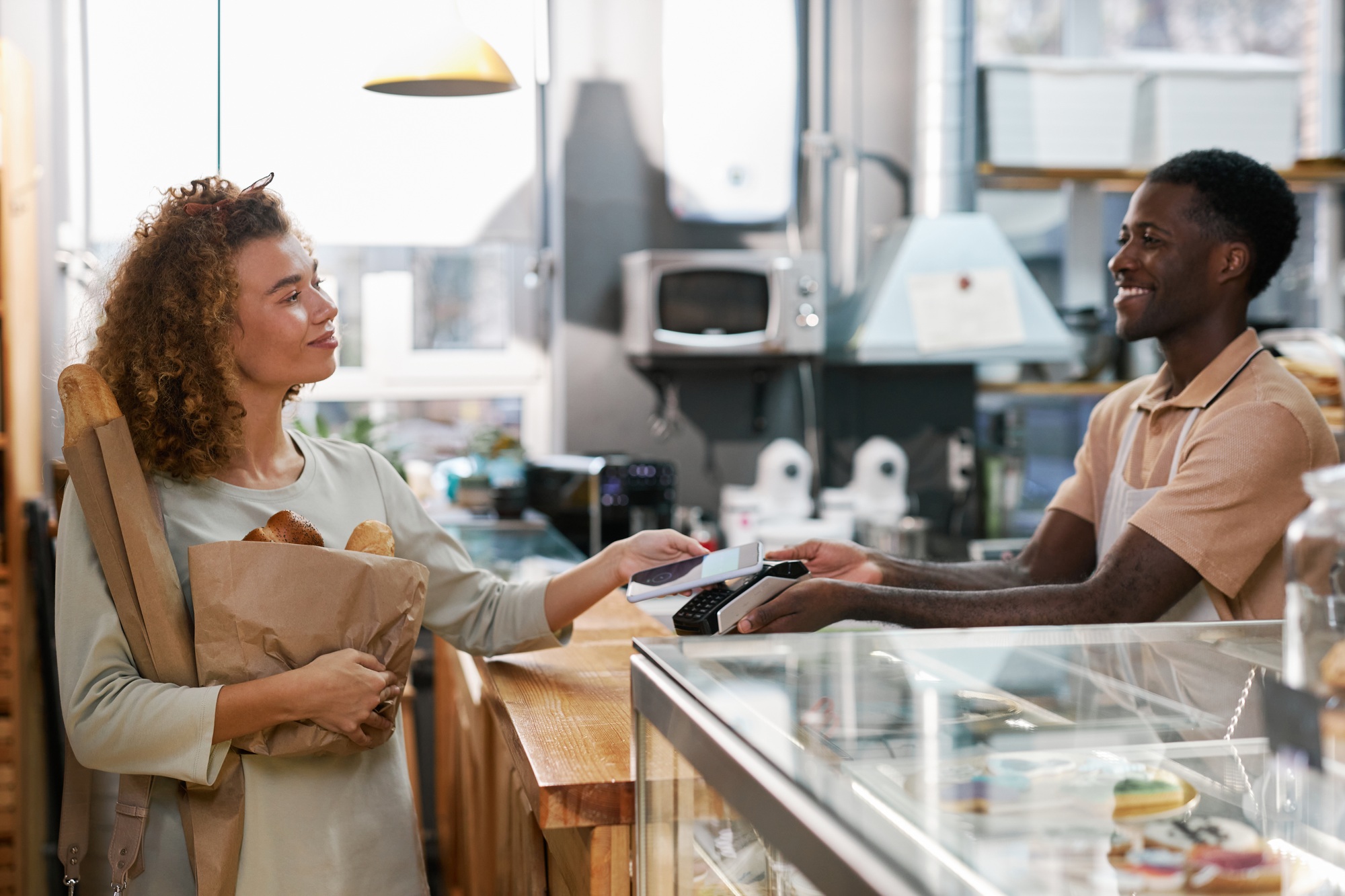 Woman Using Contactless Payment App